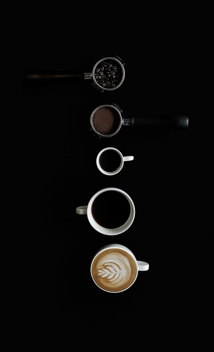 Coffee vessels arranged in a vertical sequence ending with a latte-art cup